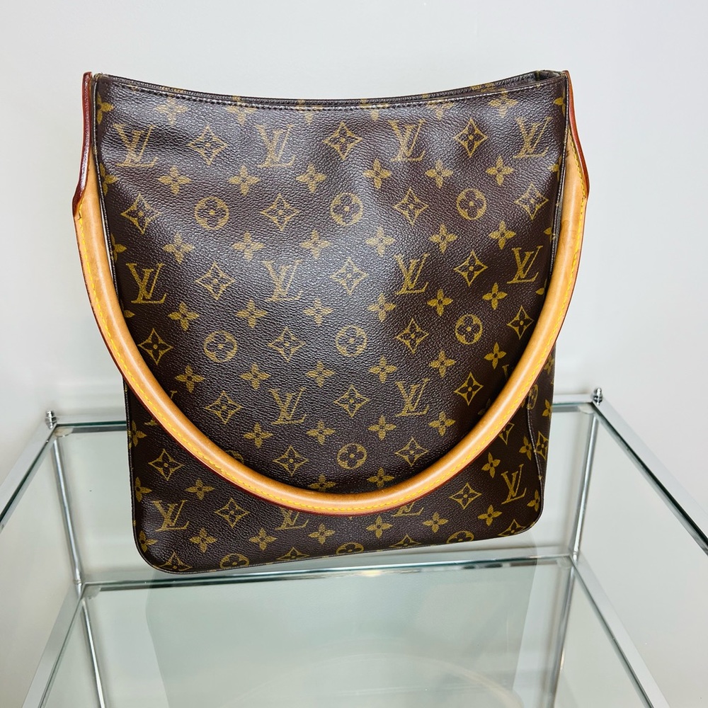 Authentic gorgeous Louis Vuitton Looping Monogram GM in excellent condition.